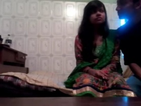 Unseen young desi couple in a steamy video