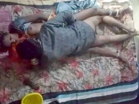 Spy on a village couple getting it on in this steamy video