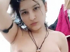 Pakistani beauty strips naked and showcases her body in a bathroom