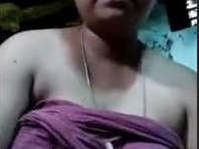 Nepali girl flaunts her ample bosom in steamy video