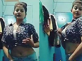 Insta Queen flaunts her tie-dyed shirt and fleshy belly while dancing sensually