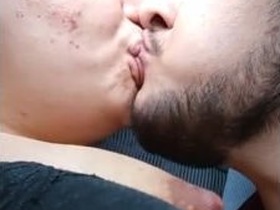 Indian couple kissing passionately in a romantic video